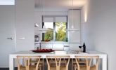 Triple-D-Neutral-Stone-Apartment-with-Natural-Accessories-kitchen-dining-pendulum-lighting-600x600